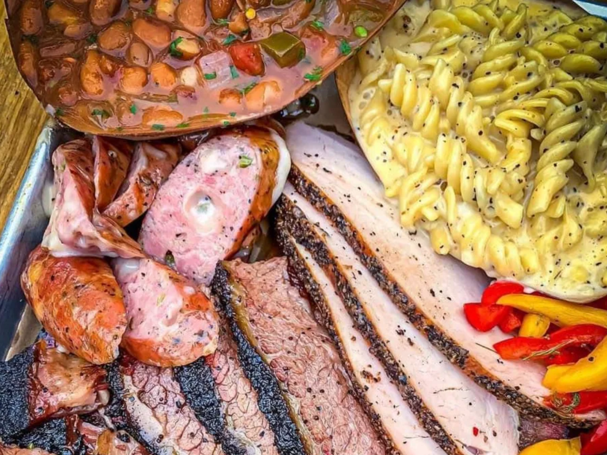 https://sanantonio.culturemap.com/media-library/2m-smokehouse-barbecue-and-sides.png?id=34242911&width=2000&height=1500&quality=85&coordinates=67%2C0%2C67%2C0