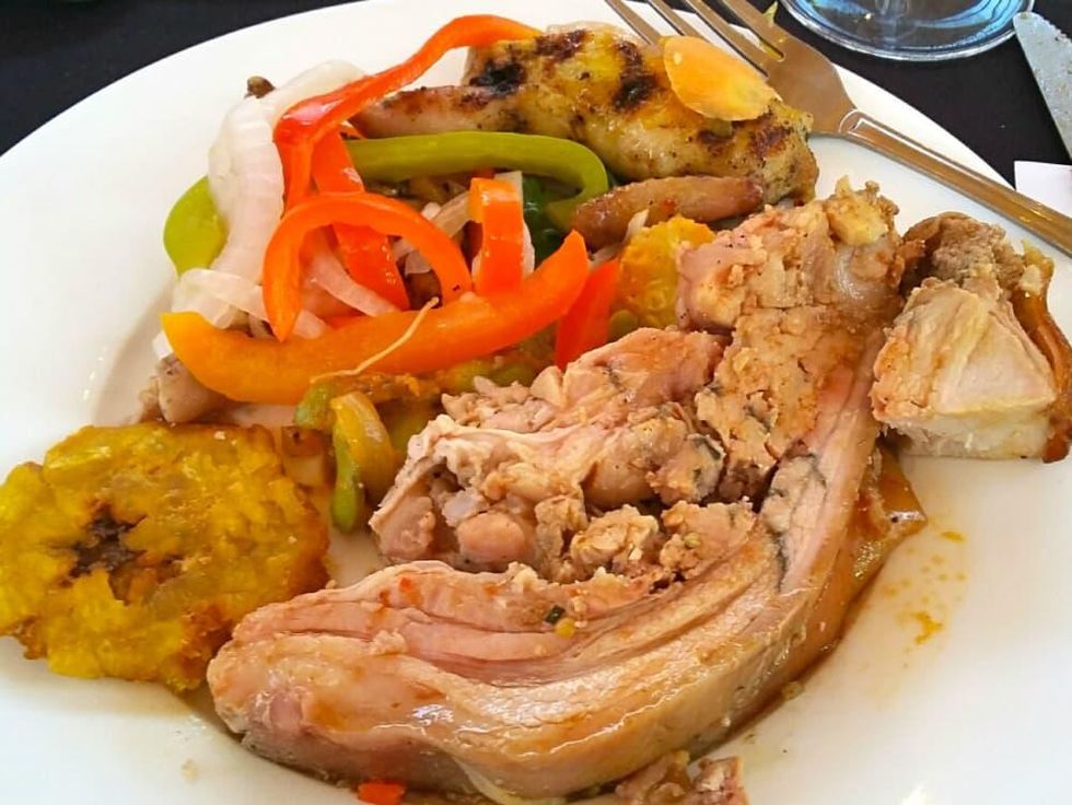 A mix of pork, lamb and grilled quail at the farm dinner.