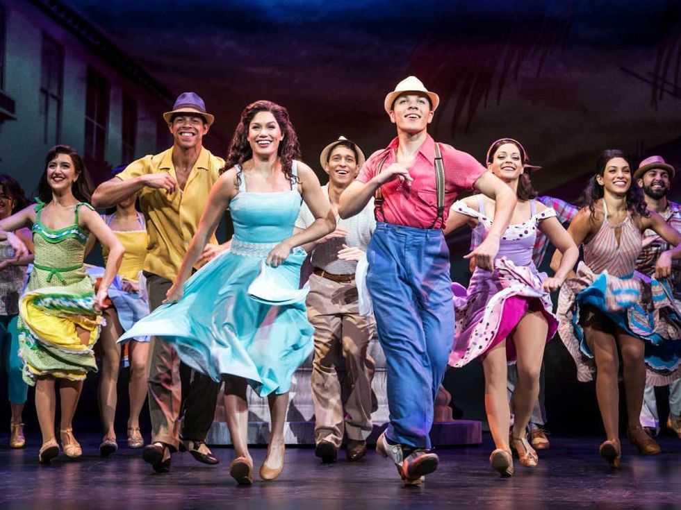 Christie Prades, Adriel Flete, and Company of On Your Feet tour