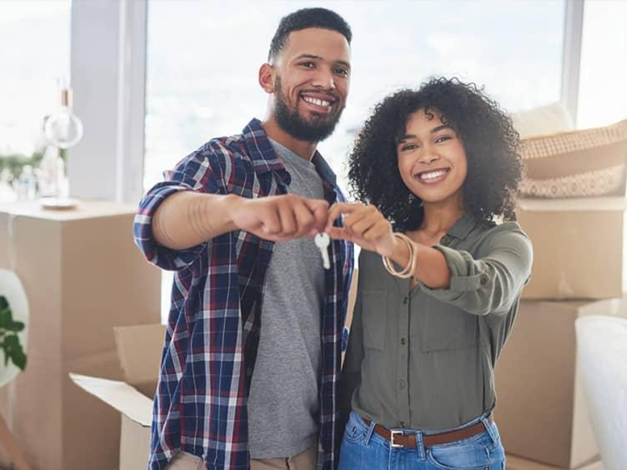 Couple holding house key