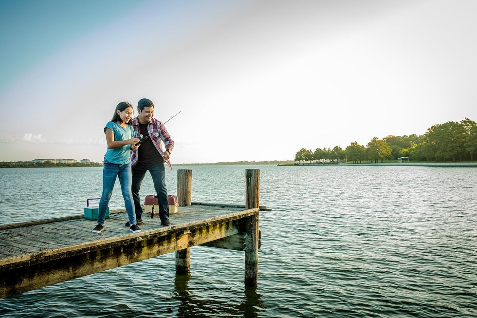Dad and daughter fishing on Lake Ray Hubbard
