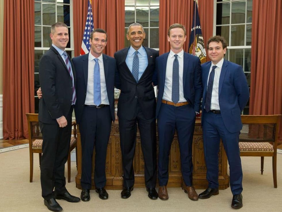 Dan Pfeiffer, Jon Favreau, Tommy Vietor, and Jon Lovett of Pod Save America with President Barack Obama