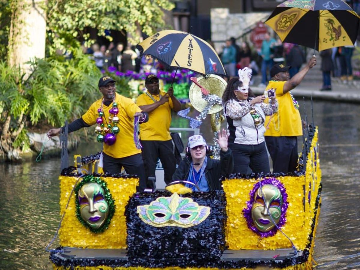 The River Walk transforms into a floating Mardi Gras celebration this