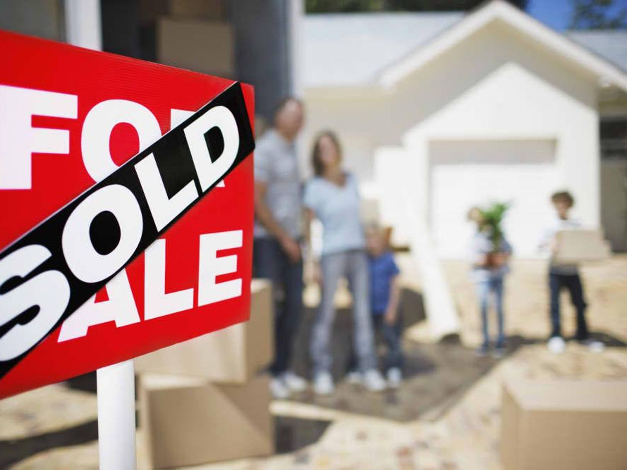 For sale sold sign with family