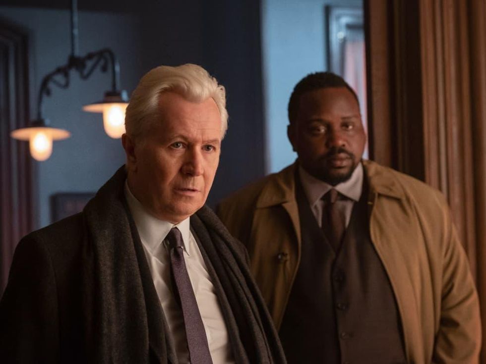 Gary Oldman and Brian Tyree Henry in The Woman in the Window