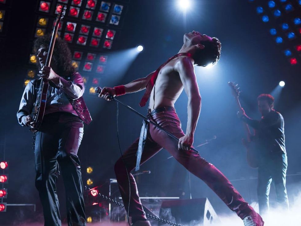 Gwilym Lee (Brian May), Rami Malek (Freddie Mercury), and Joe Mazzello (John Deacon) star in Twentieth Century Fox’s BOHEMIAN RHAPSODY.] Gwilym Lee, Rami Malek, and Joe Mazzello in Bohemian Rhapsody