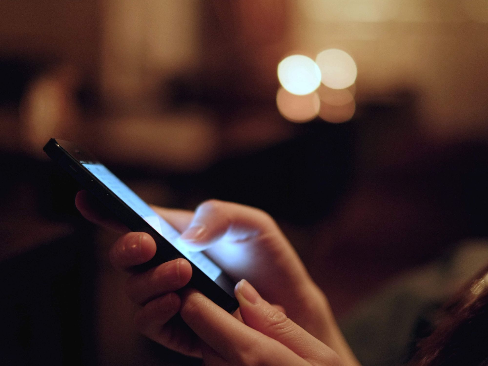 Holding phone at night