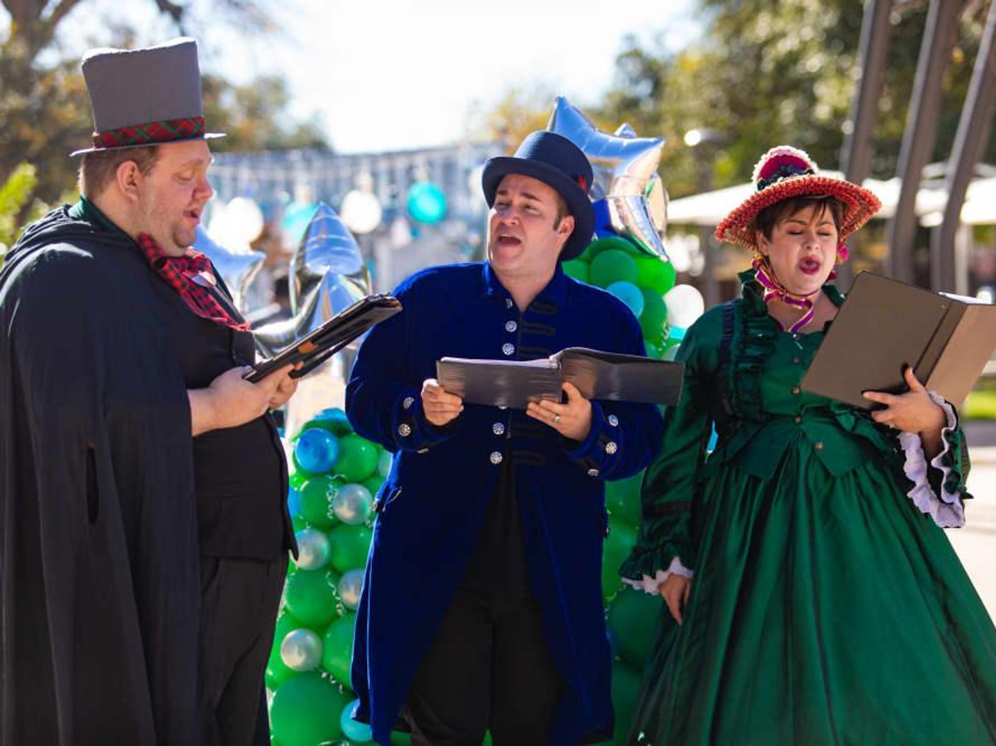 Holiday christmas carolers hemisfair drive-thru experience