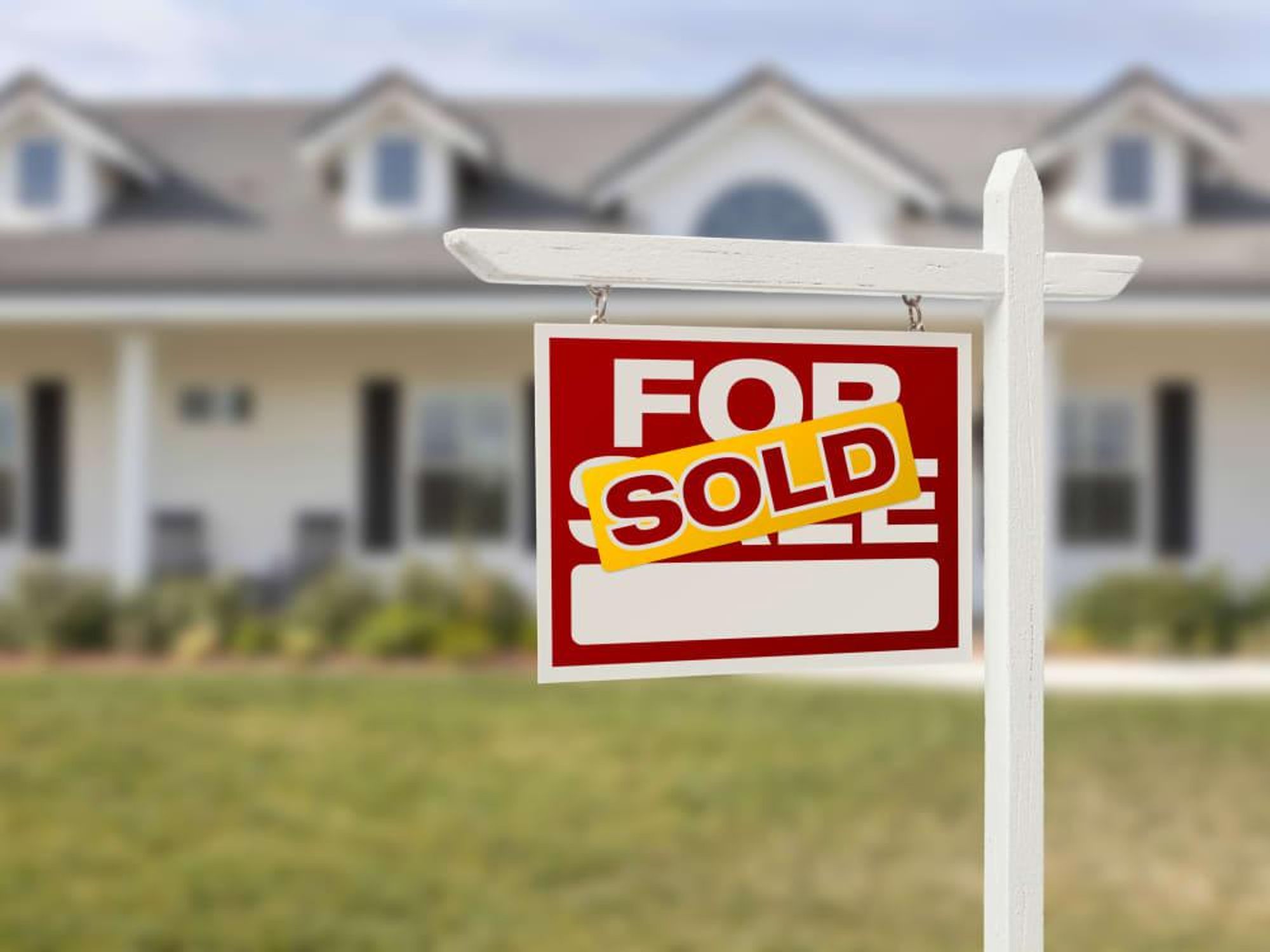 Home for sale sold sign