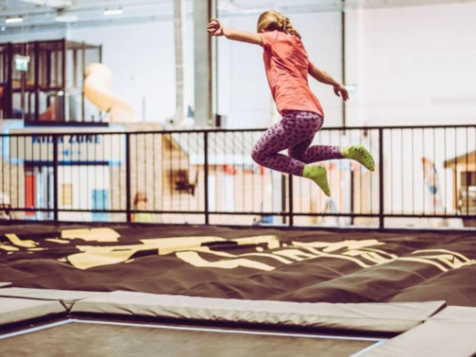 House of Air girl jumping trampoline