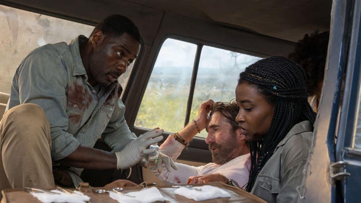 Idris Elba, Sharlto Copley, and Iyana Halley in Beast