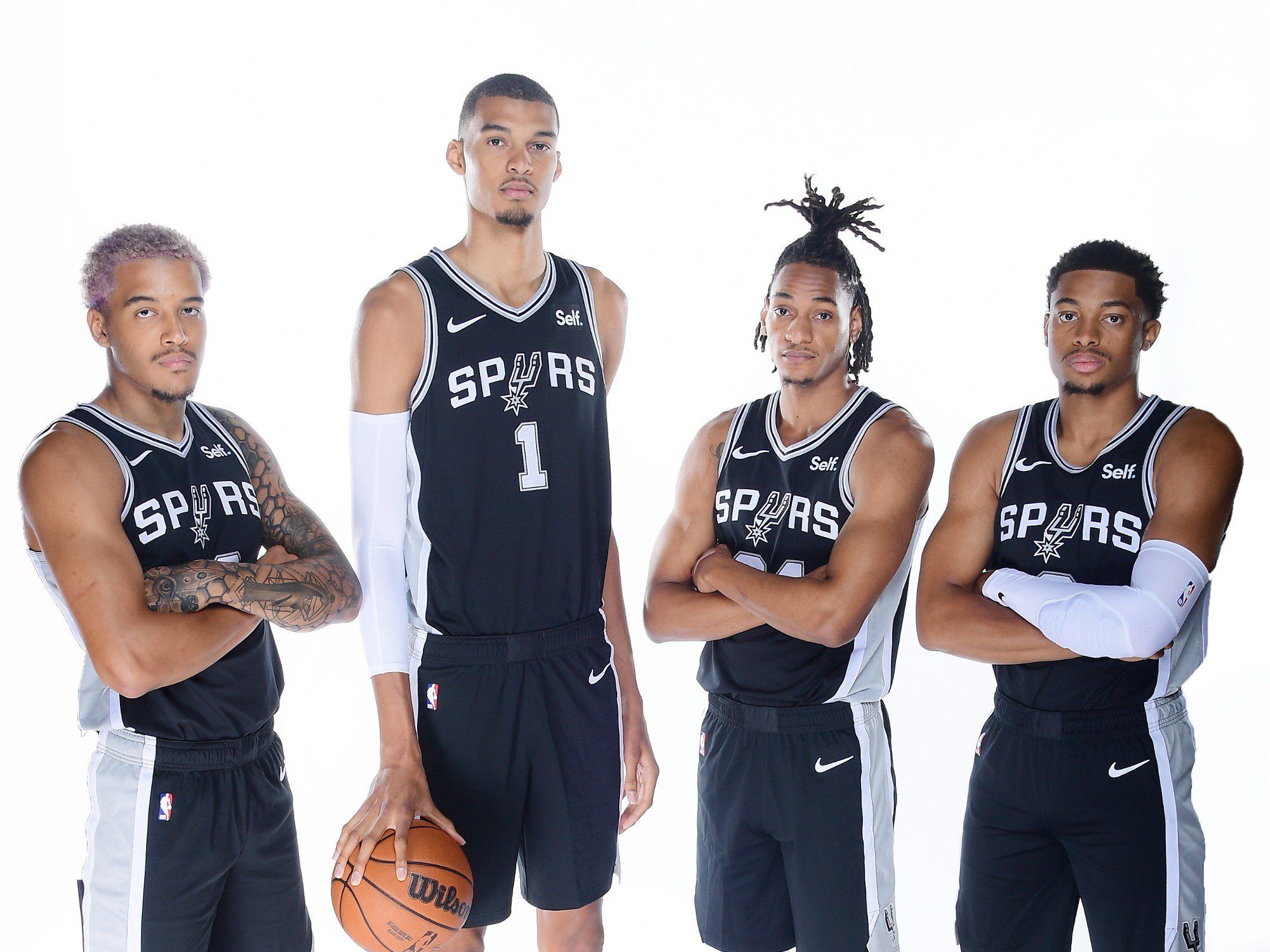 Jeremy Sochan, Victor Wembanyama, Keldon Johnson, and Devin Vassell of the 23-24 San Antonio Spurs