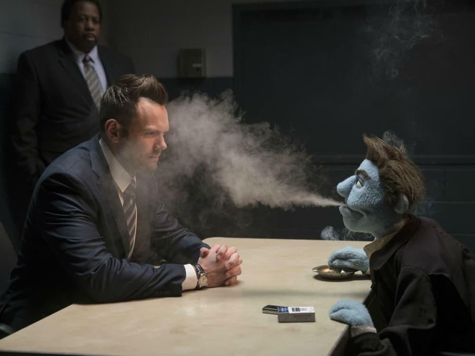 Joel McHale and Phil Phillips in The Happytime Murders