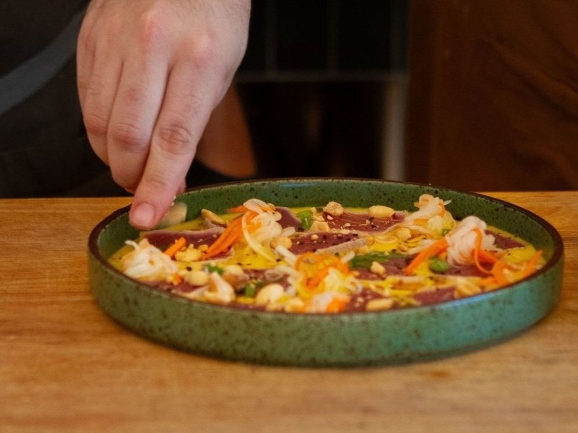 Leche de Tigre Cebicheria Peruana San Antonio dish