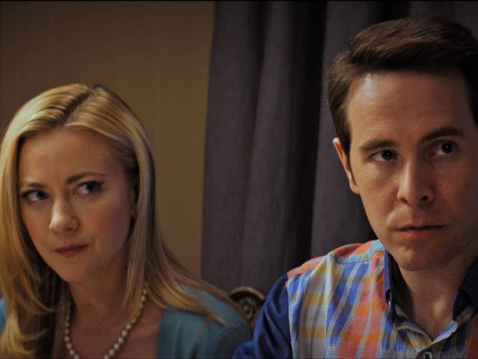 Meredith Hagner and Jon Barinholtz in The Oath