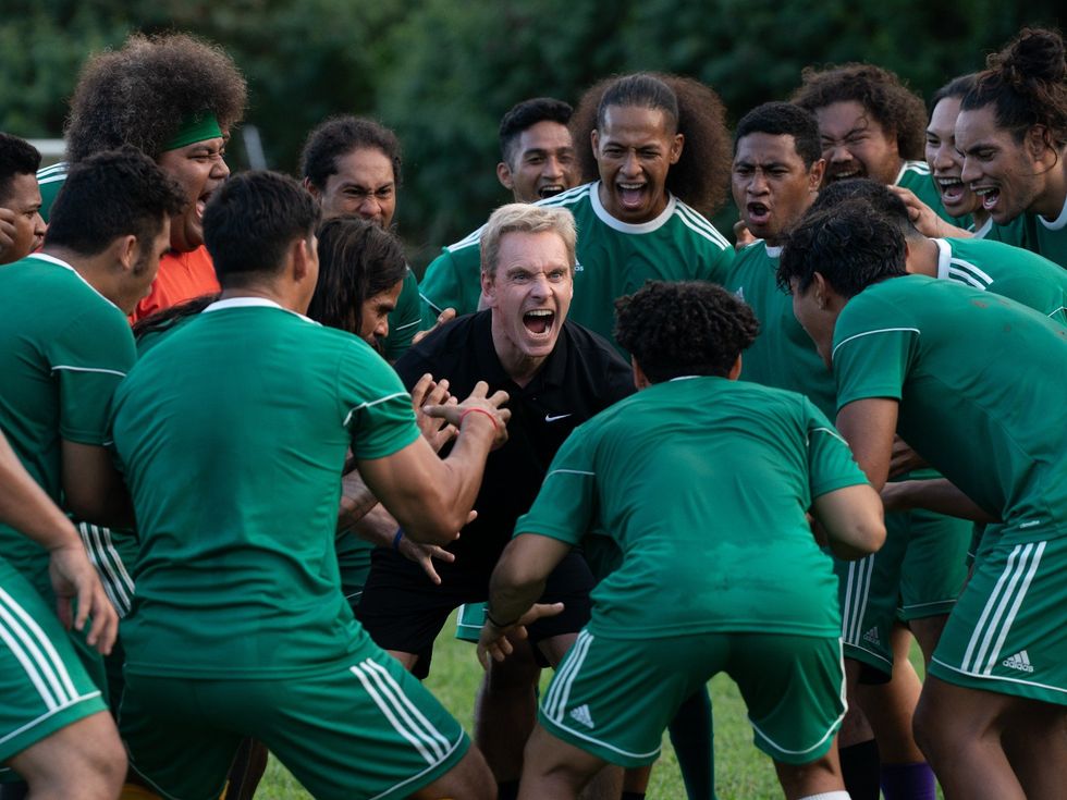 Michael Fassbender and cast of Next Goal Wins