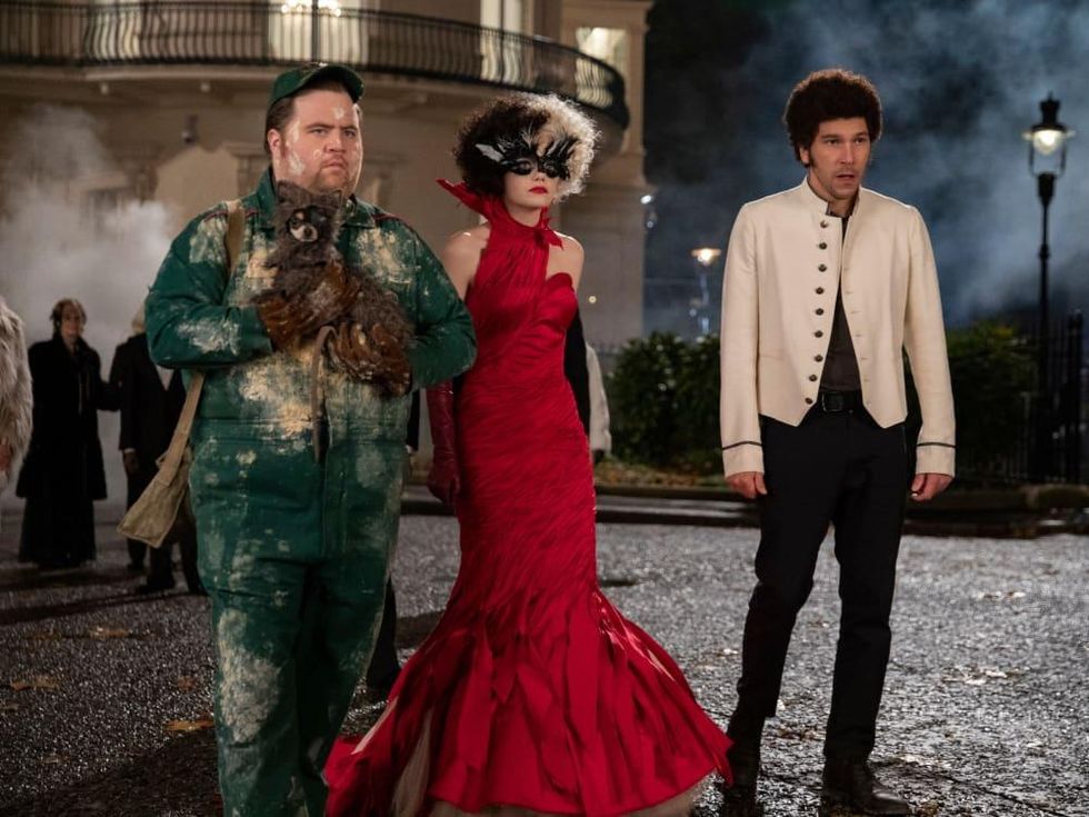 Paul Walter Hauser, Emma Stone, and Joel Fry in Cruella
