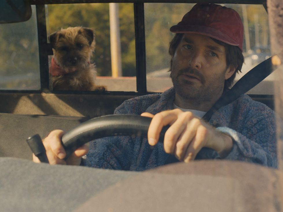 Reggie (Will Ferrell) and Will Forte in Strays