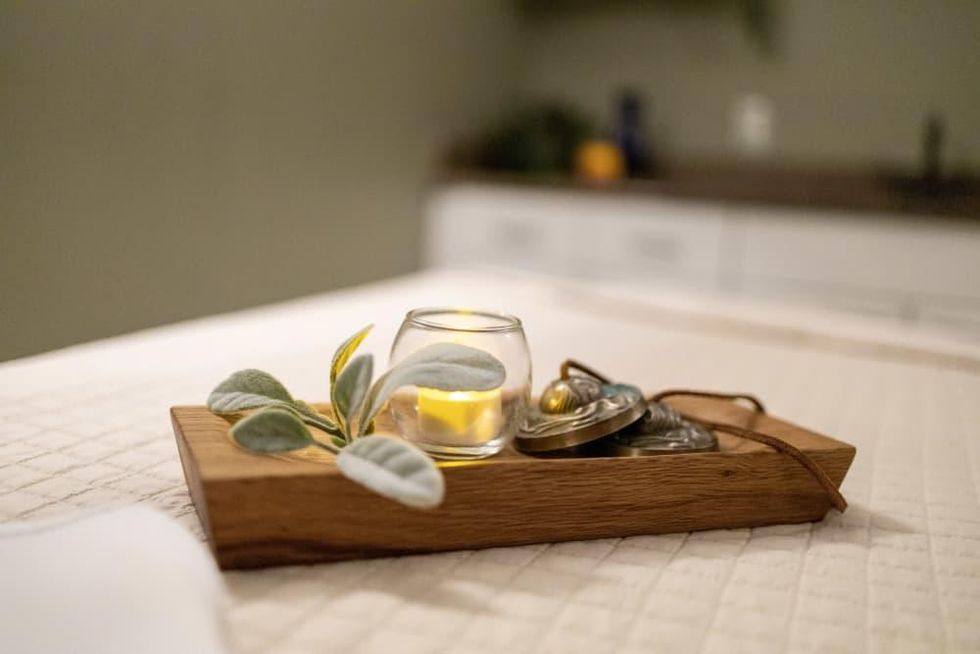 Sage, a candle and Tingsha cymbals at the Hotel Contessa spa.
