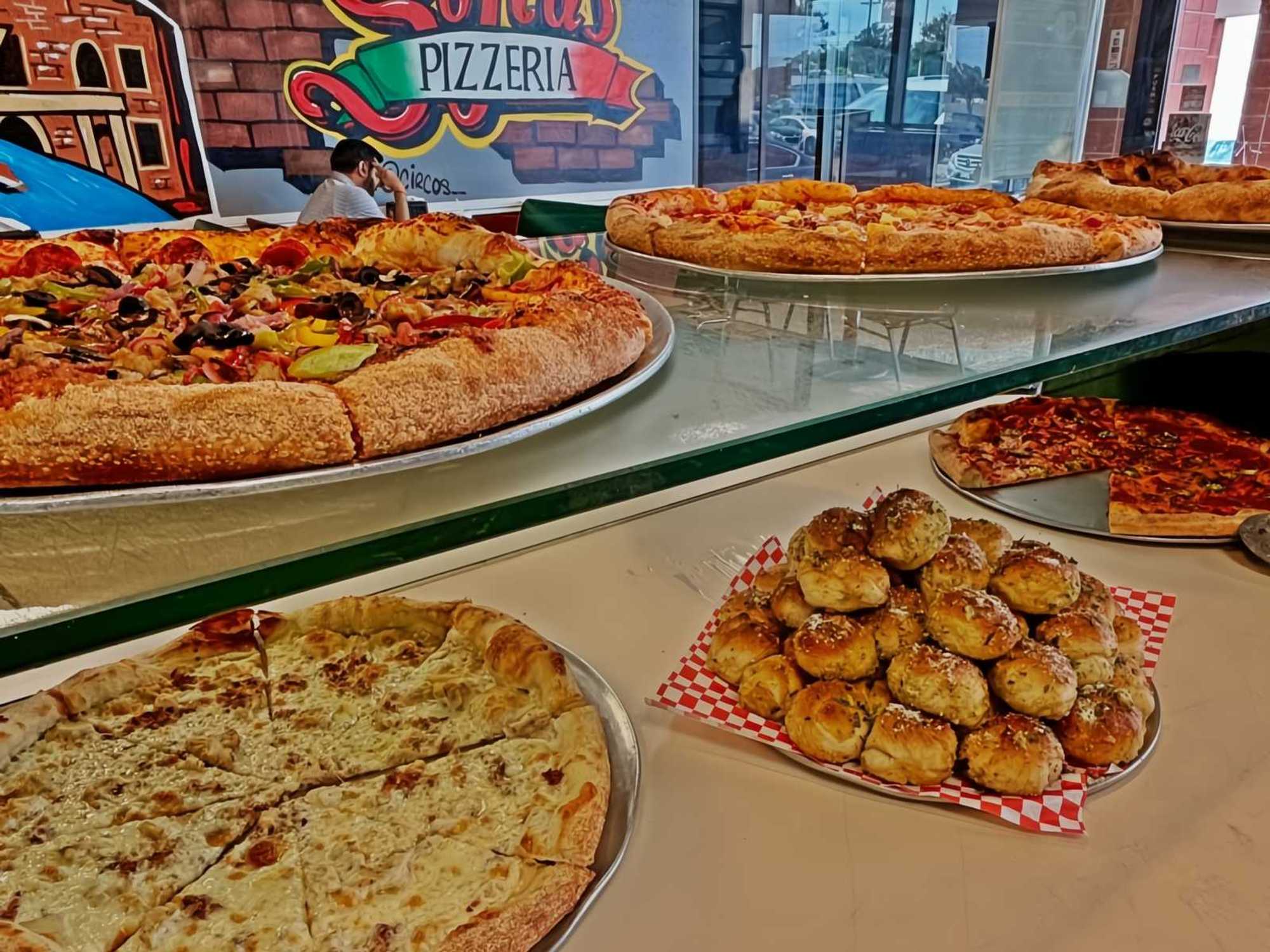 Sofia's Pizzeria San Antonio slices and garlic knots