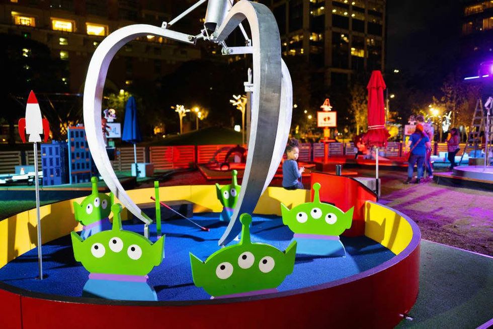 Take a swing at Pixar Putt.