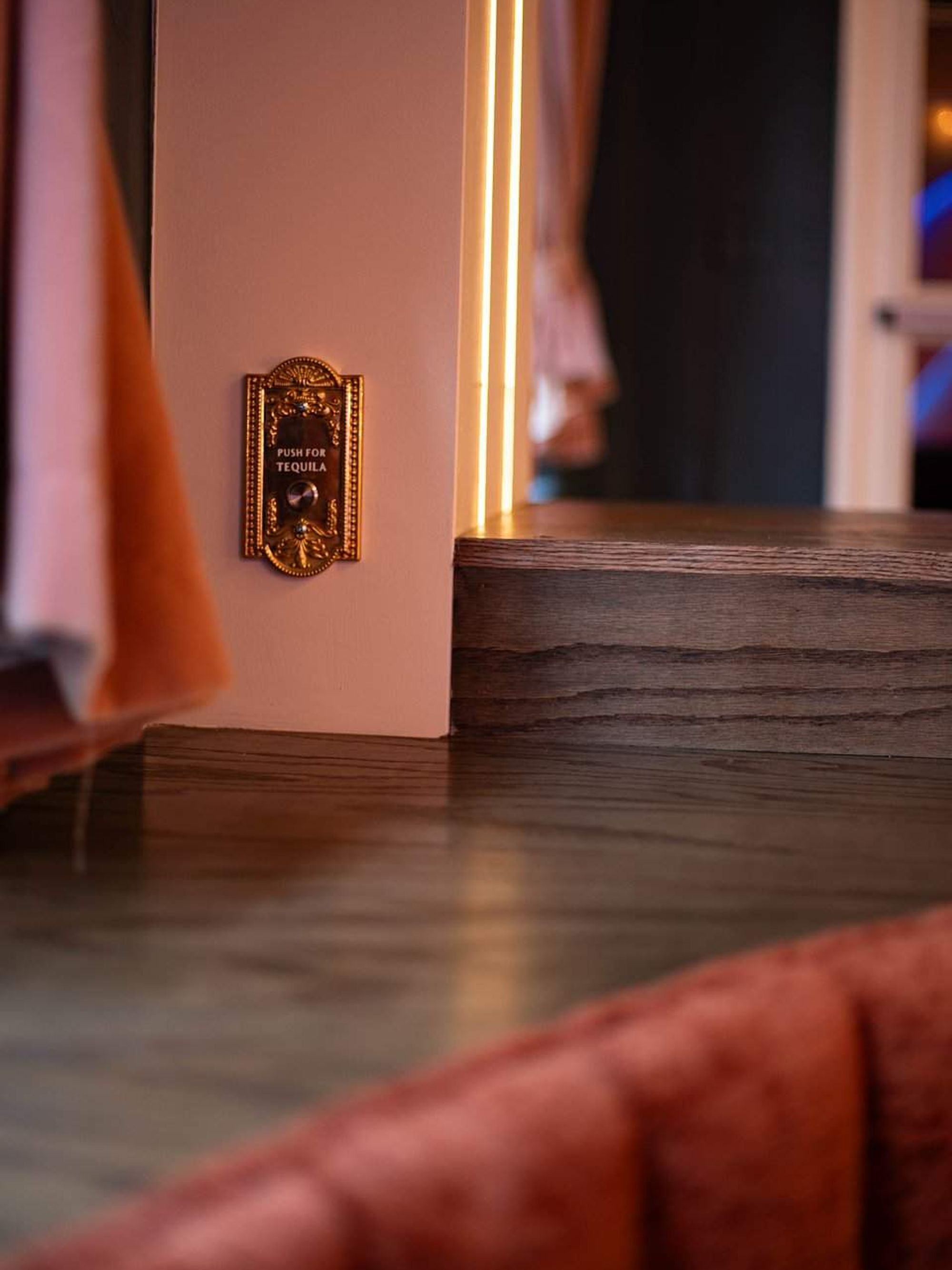 Tequila button at Pink Shark's secret room in San Antonio