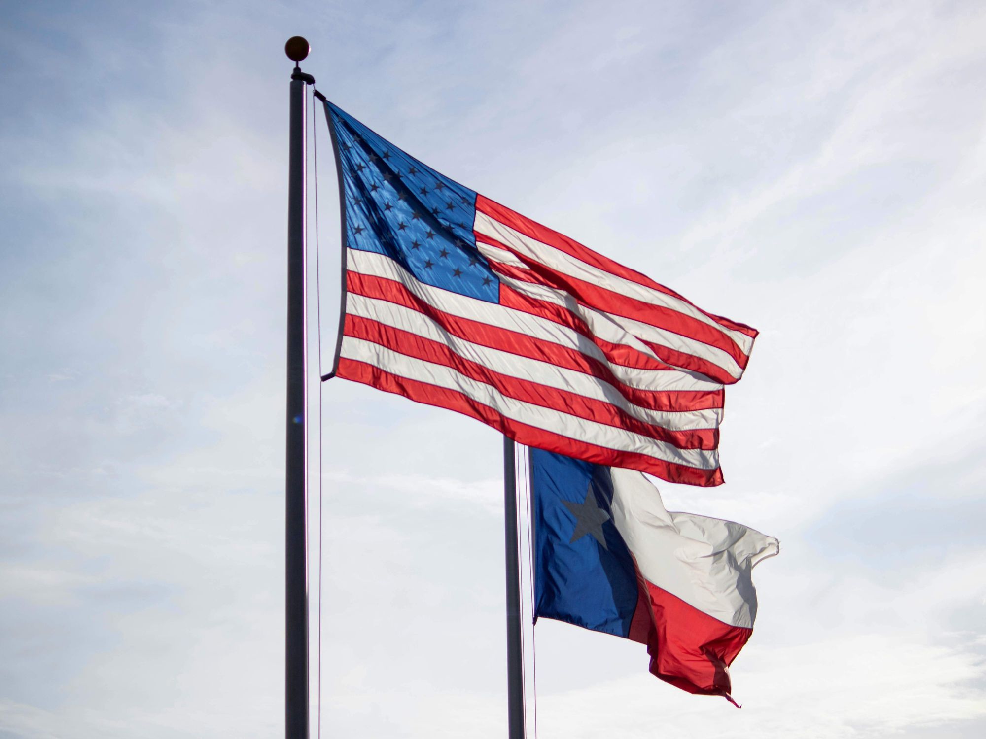 Texas flag, American flag