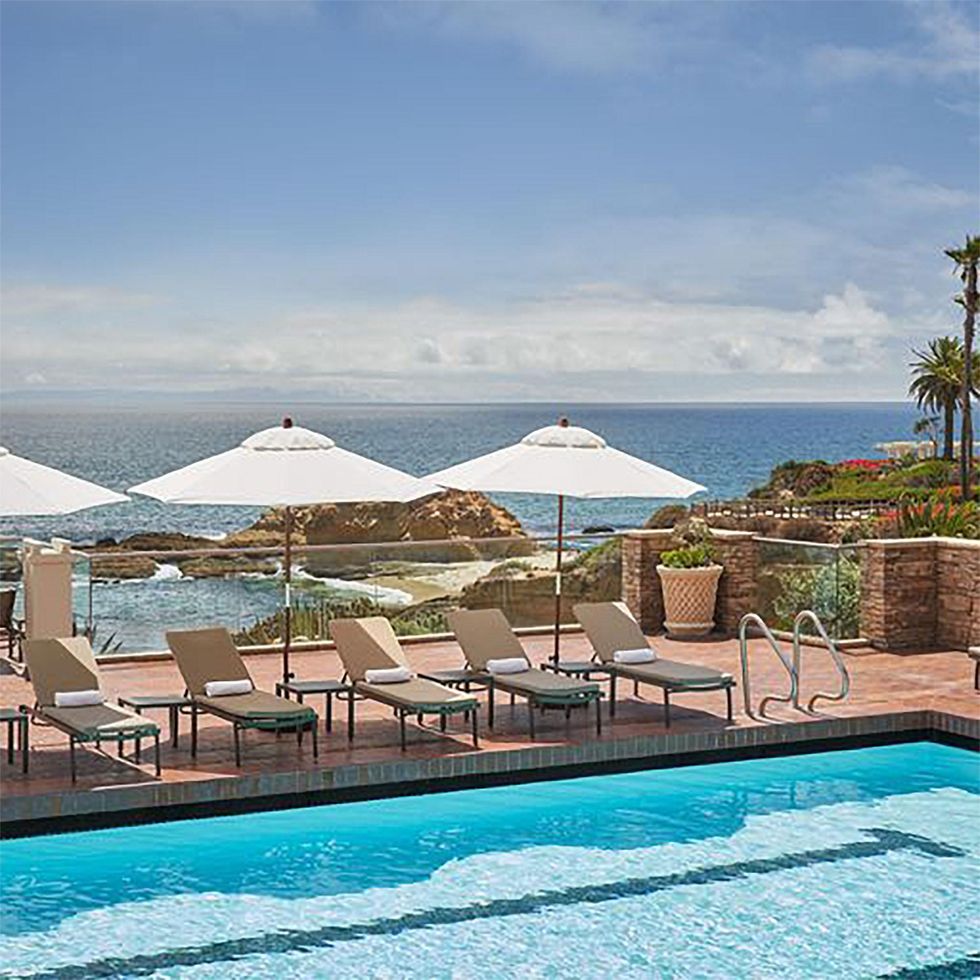The pool overlooks the Pacific.