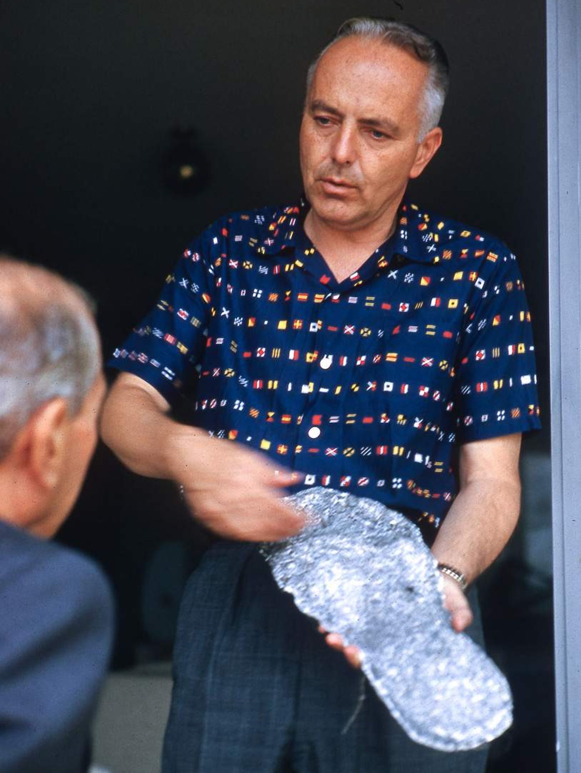 Tom Slick showing off cast of yeti footprint