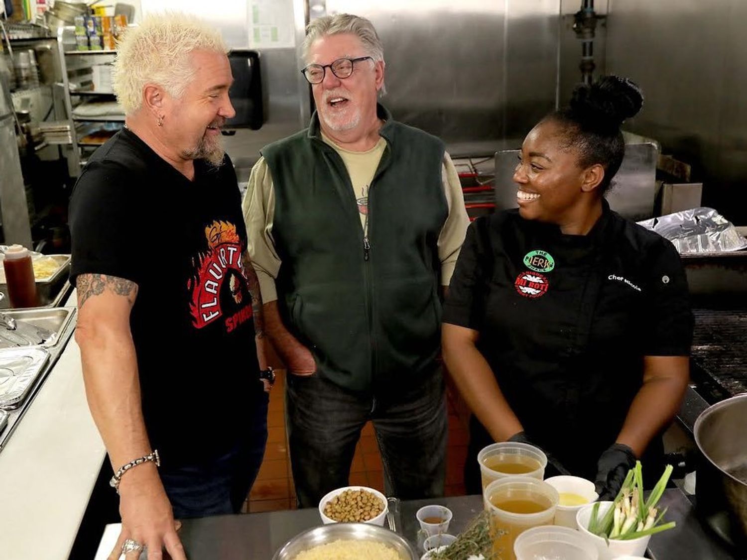 \u201cDiners, Drive-ins and Dives\u201d star/host Guy Fieri visits with actor Bruce McGill and Chef Nicola Blaque at The Jerk Shack in San Antonio.