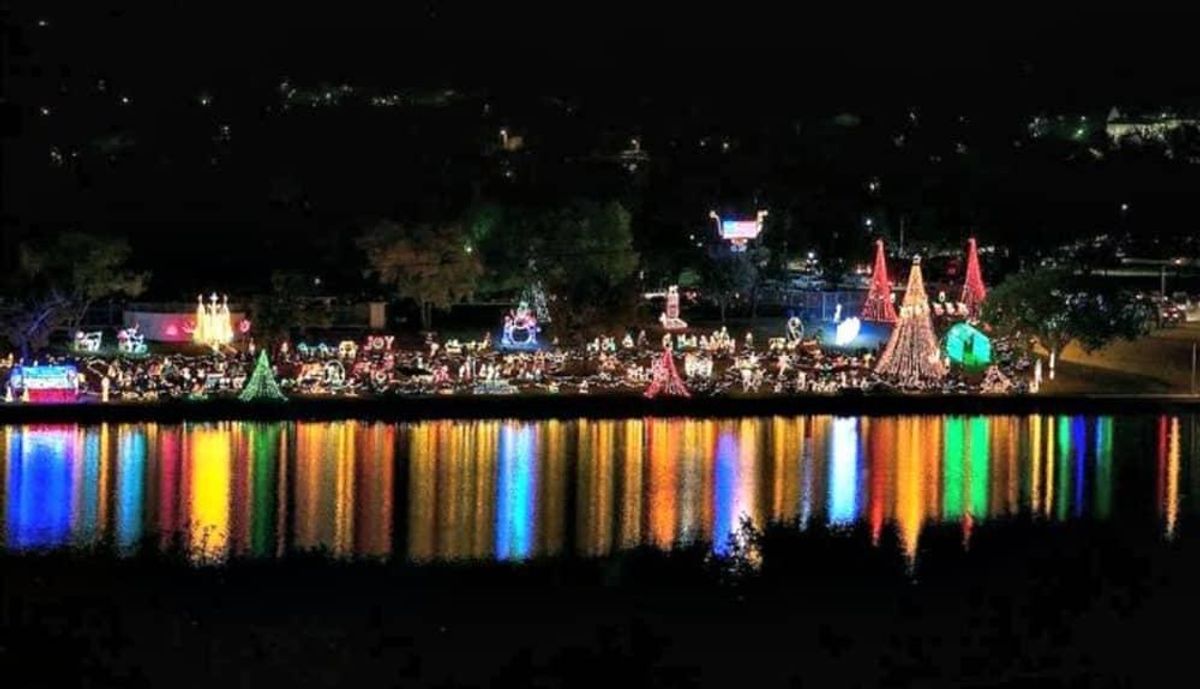 Walkway of Lights in Marble Falls reflects into the lake. CultureMap